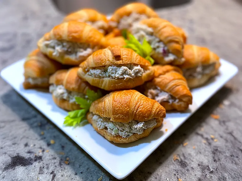 Platter of chicken salad croissant minis